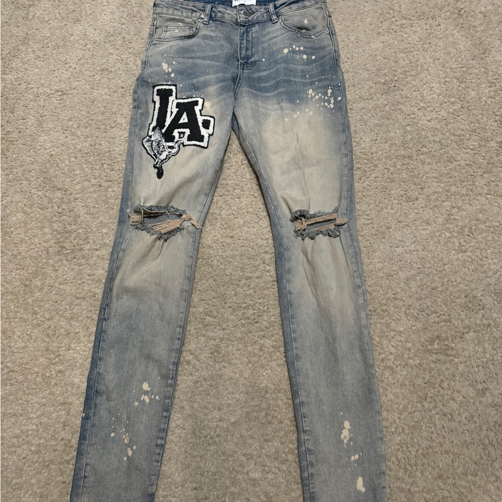 Men's Distressed Light Blue Jeans